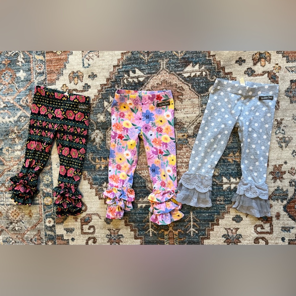 Three pairs of Matilda Jane ruffle bottom leggings. EUC